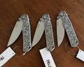 Engraved RUIKE Folding Knife — Floral Scrollwork view 3