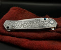 Engraved RUIKE Folding Knife — Floral Scrollwork view 2