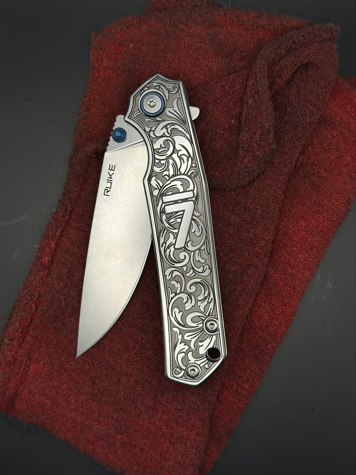 Engraved RUIKE Folding Knife — Floral Scrollwork